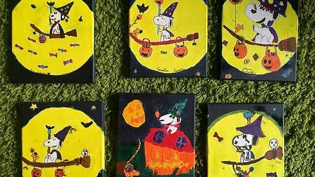 Gemalte bilder von der Comicfigur "Snoopy" als Hexe